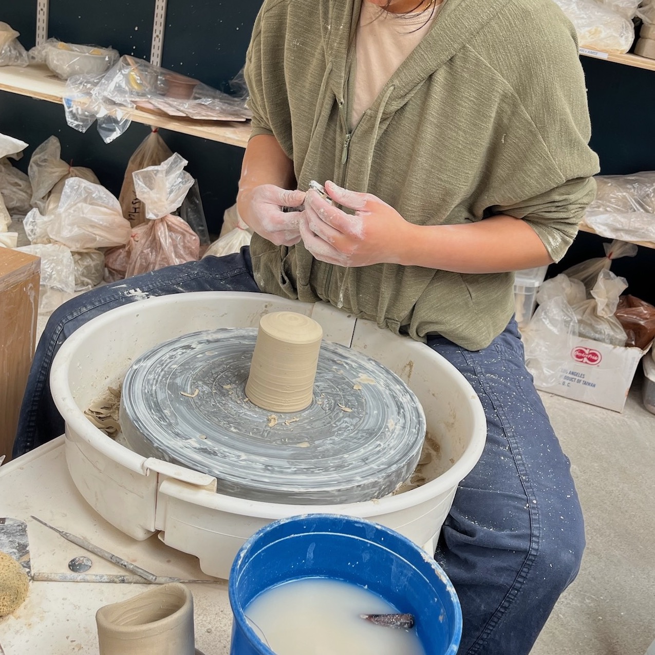 Deya working in her Oakland studio